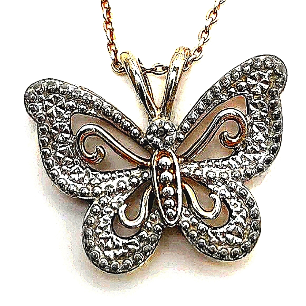 Gold over silver butterfly pendant on chain